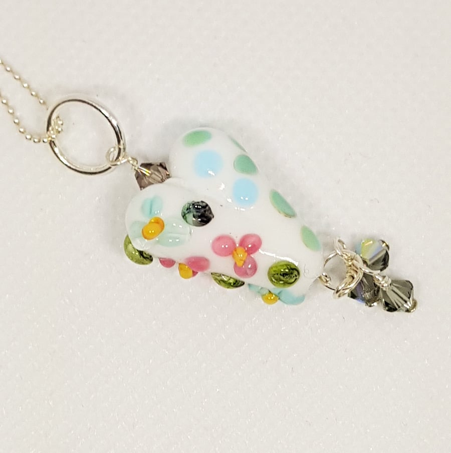 Blue Spots and Flowers Lampwork Glass Heart Focal Bead Necklace on sterling silv