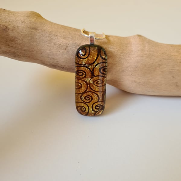 Fused glass swirly patterned pendant