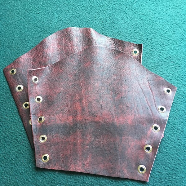 Large Pair of Marbleised Black & Burgundy coloured Leather Bracers 