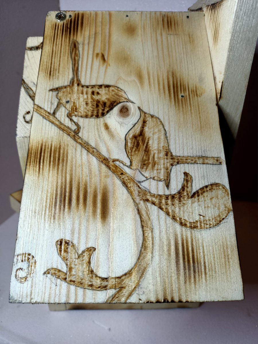 Wooden Bird house with birds