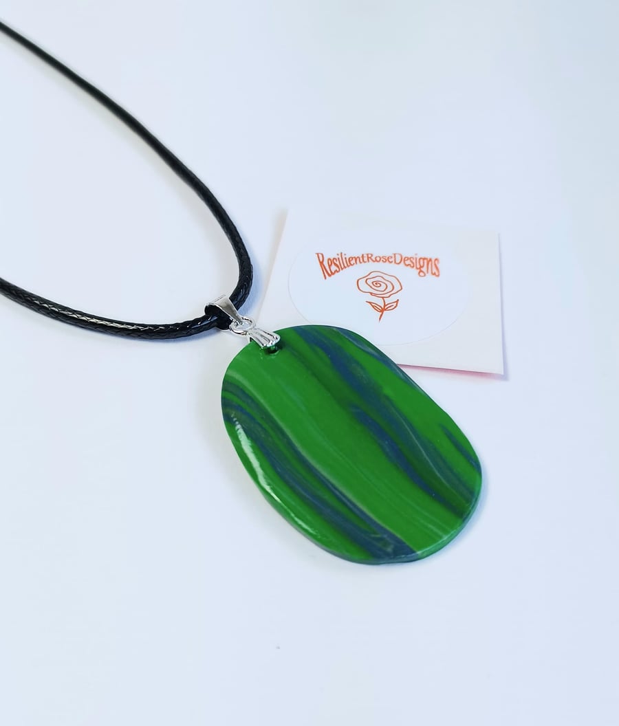 Emerald green and blue marble effect oval pendant