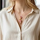 Rhodonite & Faceted Garnet Pendant - 18” Gold Plate Chain