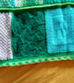 baby and toddler handmade knitted baby blanket in green colourway. - Image 1