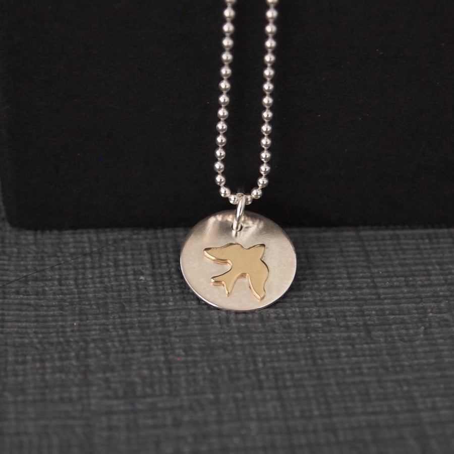 Sterling Silver Swallow Pendant with Golden Coloured Swallow Bird