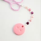 Paw Beaded Scissor Fob with pink cat paw print. Gift for cross stitcher.