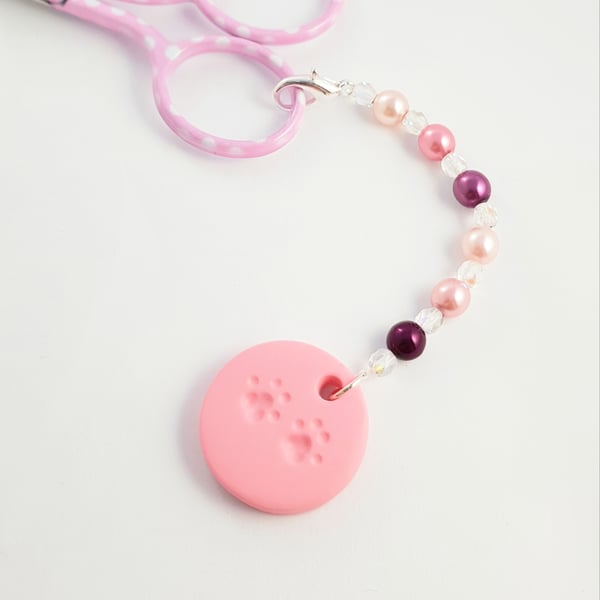 Paw Beaded Scissor Fob with pink cat paw print. Gift for cross stitcher.