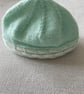 Aqua coloured baby’s hat with a cream border - Image 2