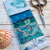 Embroidered up-cycled seascape bookmark.  