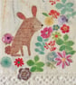 Cute Bunny Amongst Flowers, an original textile and mixed media framed art piece - Image 2