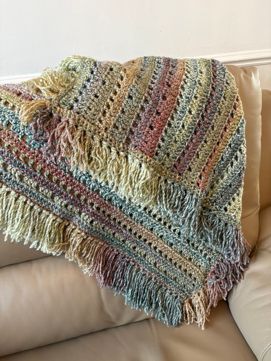 Beautiful fringed blanket earthy tones