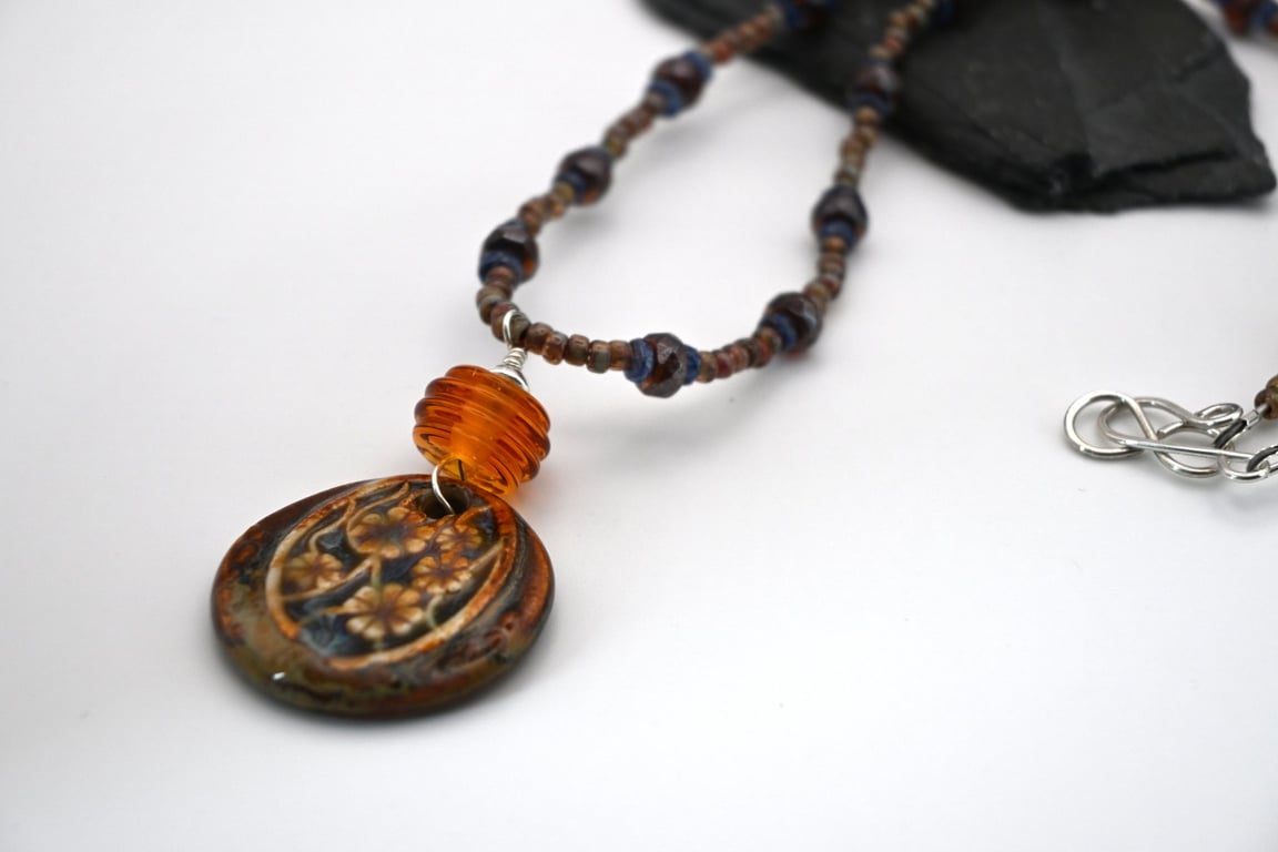 Kyanite gemstone and ceramic pendant necklace