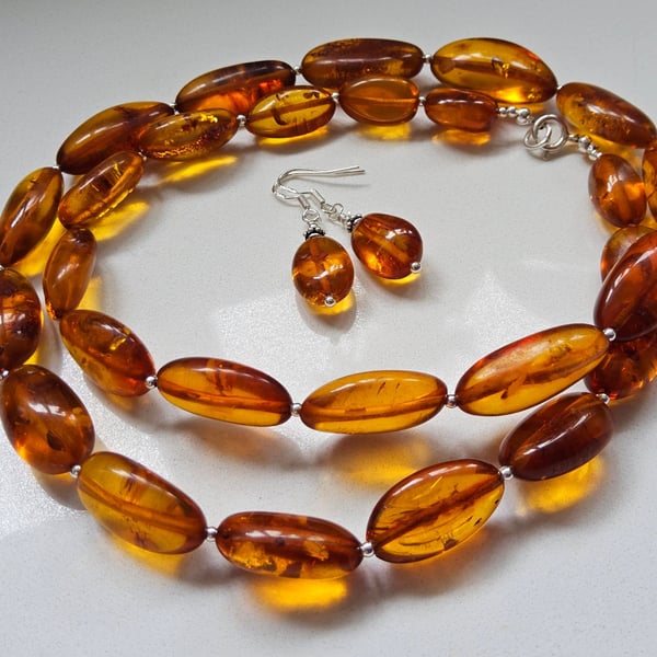 Re string customer's Baltic Amber Necklace and make earrings