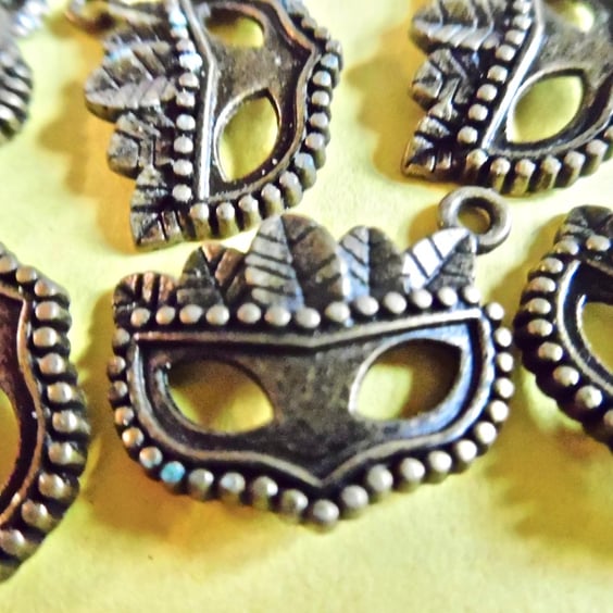 15 x Bronze Tone Masks with feathers  charms 