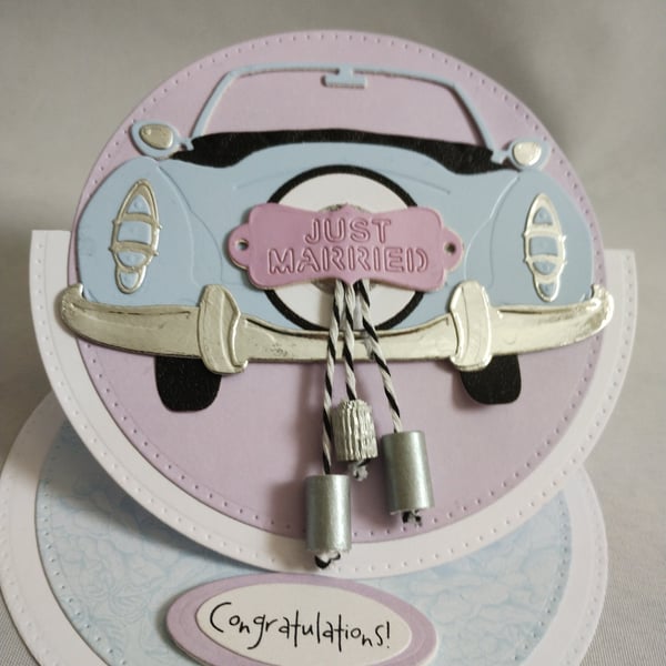 Just Married-Congratulations - an easel card with blue car and dangly tin cans  