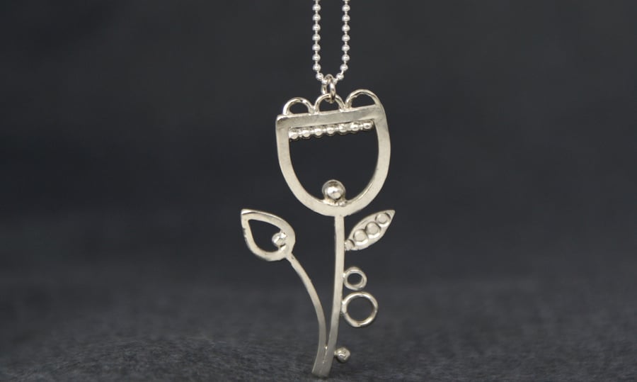 Silver pod and bud flower pendant