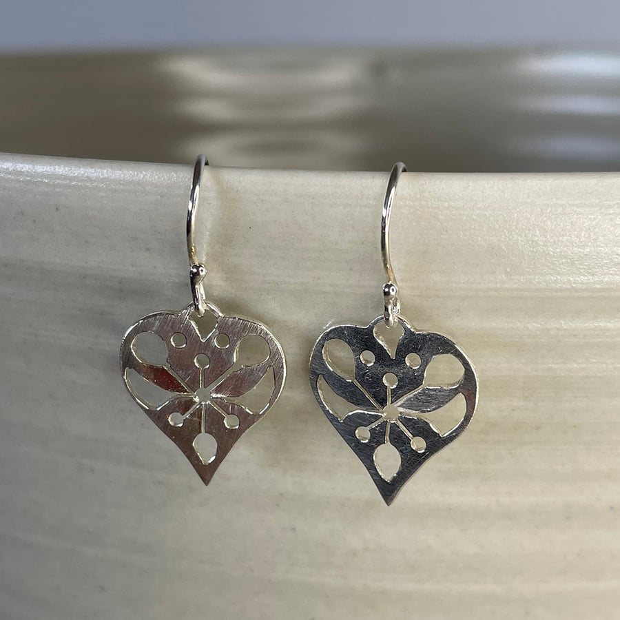 Sterling silver decorative cut out pattern heart drop earrings