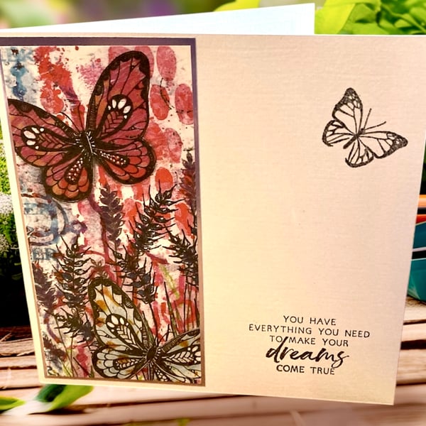 Blank abstract butterfly and floral card for any occasion.