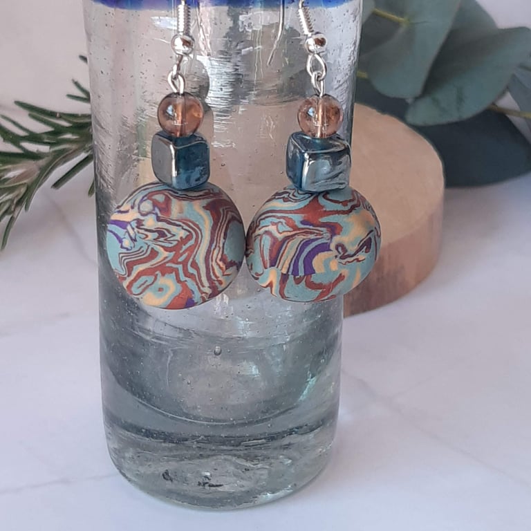 Turquoise, purple and sienna dangly disc polymer clay earrings 