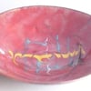 Enamel dish -scrolled turquoise, white and yellow on red over clear enamel