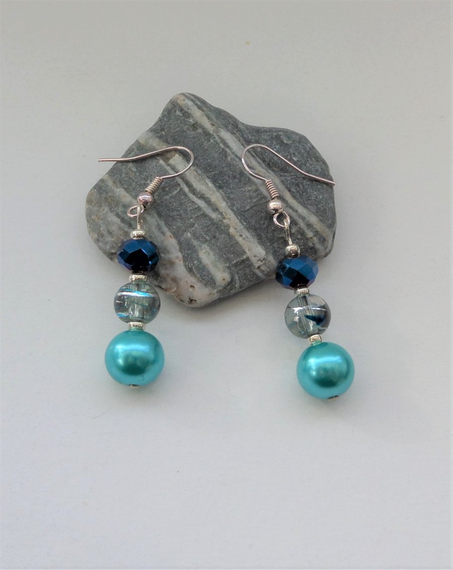 Turquoise blue glass pearl, clear and dark blue crystal bead earrings
