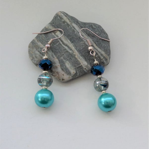 Turquoise blue glass pearl, clear and dark blue crystal bead earrings