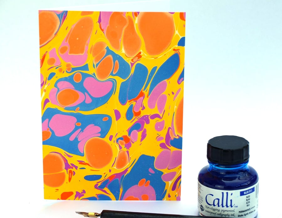 Bright and bold colourful marbled paper art greetings card stone pattern