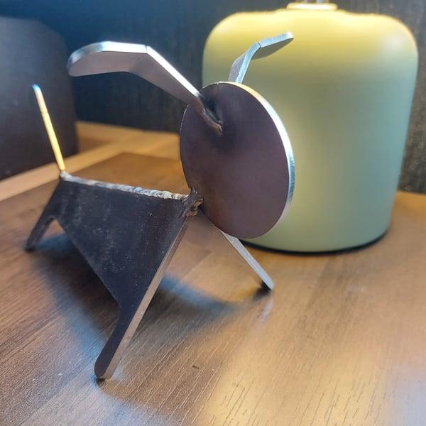 Handcrafted Industrial metal dog sculpture figurine.
