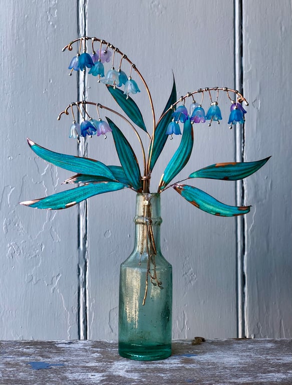 Bluebells in a vintage bottle