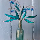 Bluebells in a vintage bottle