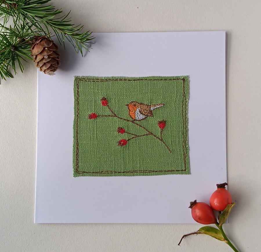 Textile Christmas Card with Embroidered Robin on a Rosehip Branch