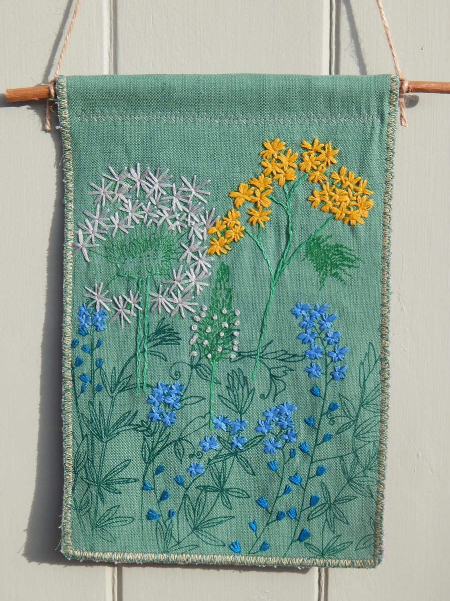 Forget me nots and wild flowers- Dark green hanger on a piece of Willow