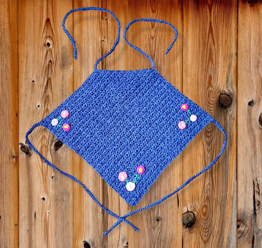 Halter top with flowers and main body colour is navy. U.K. size is small (S).