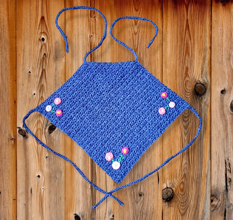 Halter top with flowers and main body colour is navy. U.K. size is small (S).