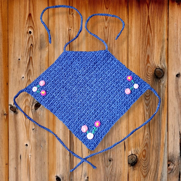 Halter top with flowers and main body colour is navy. U.K. size is small (S).