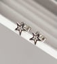 Sterling silver tiny star engraved set diamond star stud earrings - Image 1