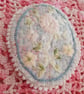 Oval, textile brooch with pastel, embroidered flowers. - Image 5