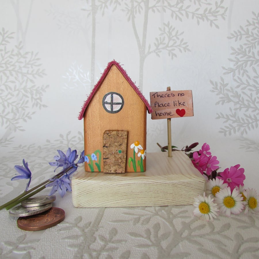 Wooden House with Sign