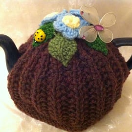 Floral crocheted tea pot cosy