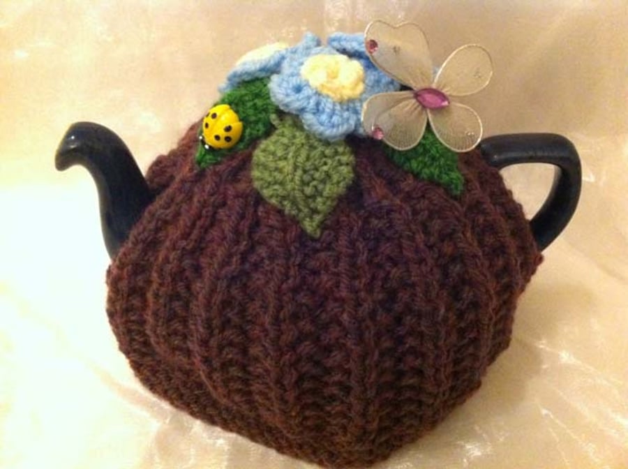 Floral crocheted tea pot cosy