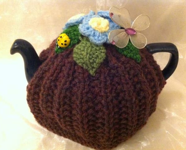 Floral crocheted tea pot cosy