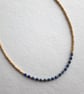 Lapis lazuli and gold glass beaded necklace, 17 to 19 inches