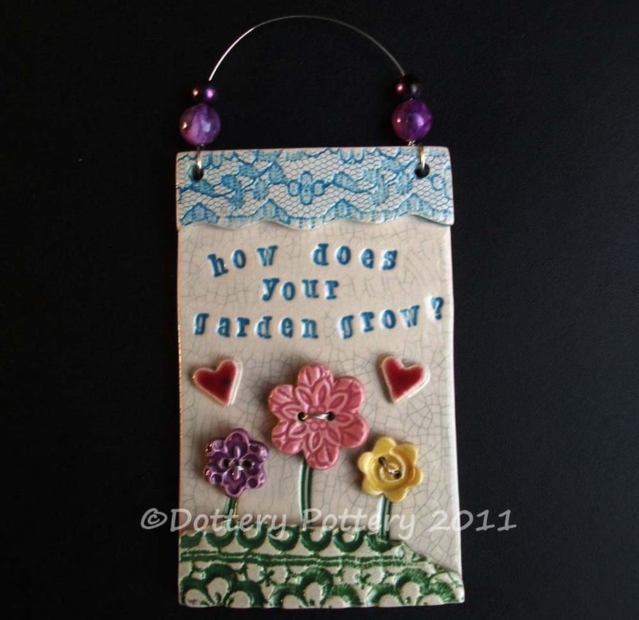 Ceramic How does your garden grow? wall plaque folksygardeners