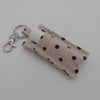 Key ring lip balm holder in spotty fabric