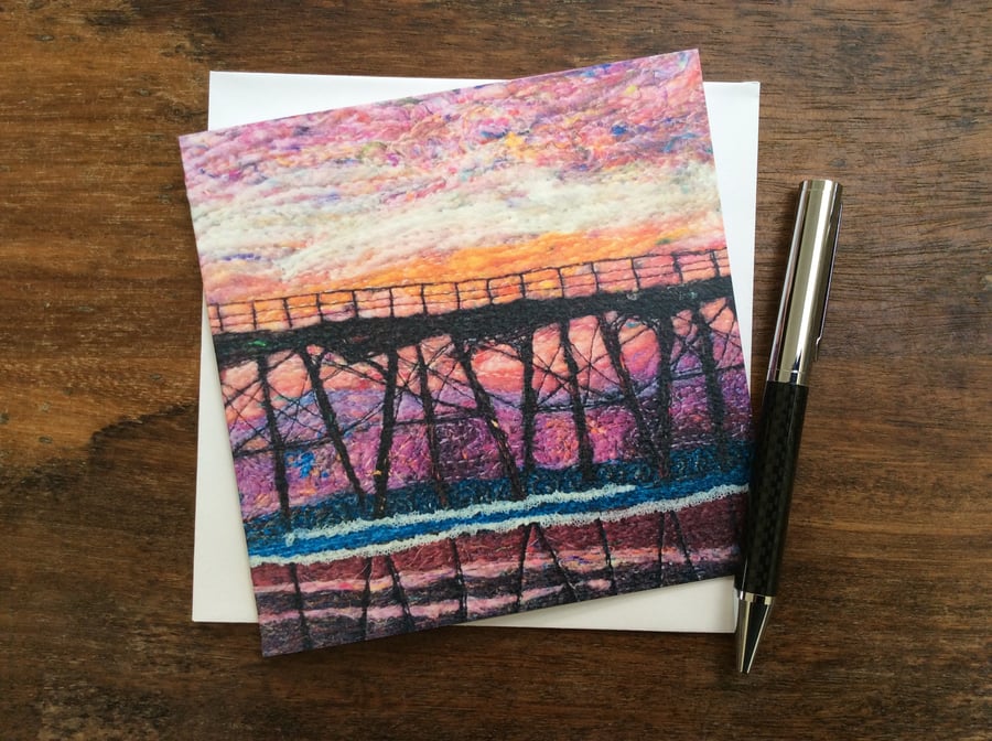 Embroidered sunset seaside pier printed greetings card. 