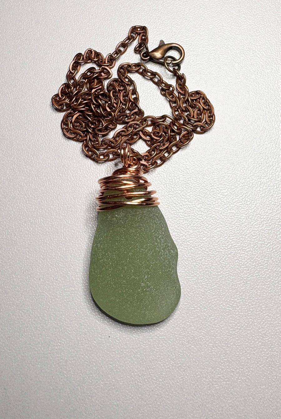 Sea glass copper wire wrapped necklace.