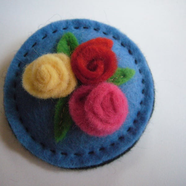 Pale blue Circle Brooch with rolled flower Trio