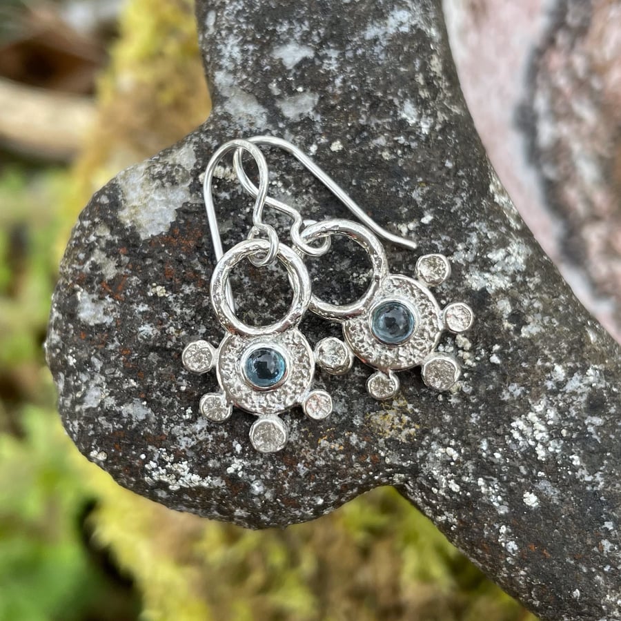 Sterling silver and blue topaz earrings,  tribal sun earrings
