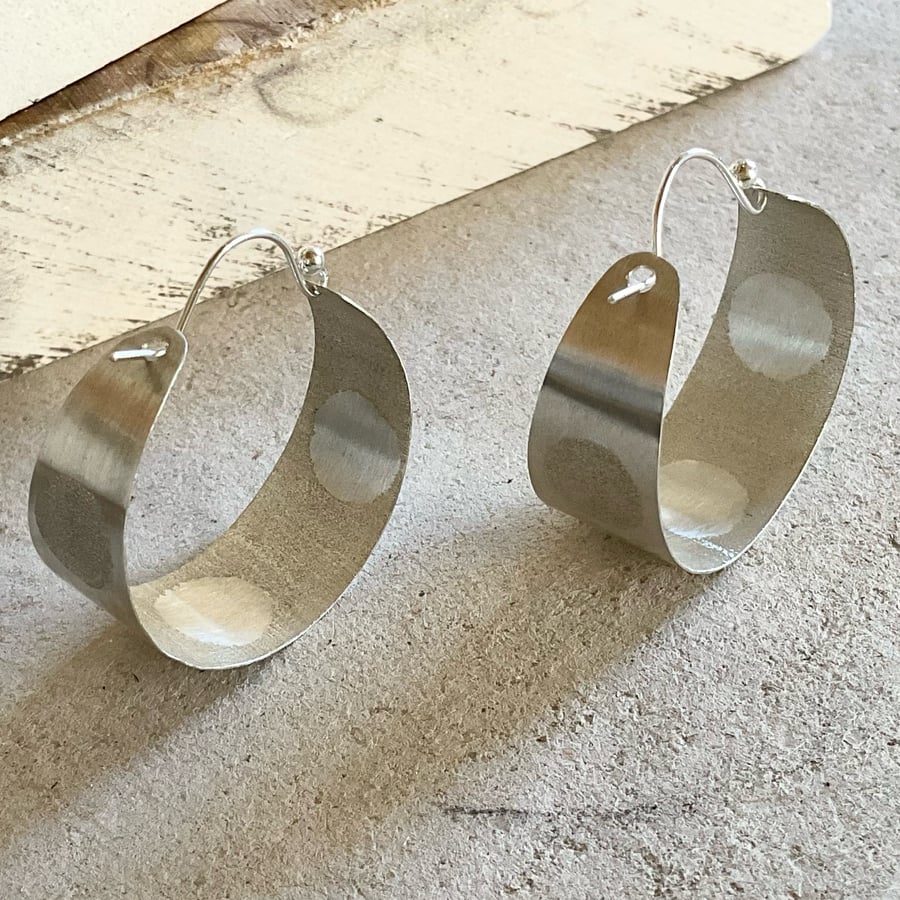 Polka dot silver hoop earrings