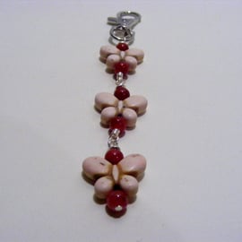 Magnesite Butterfly and Red Jade Bag charm