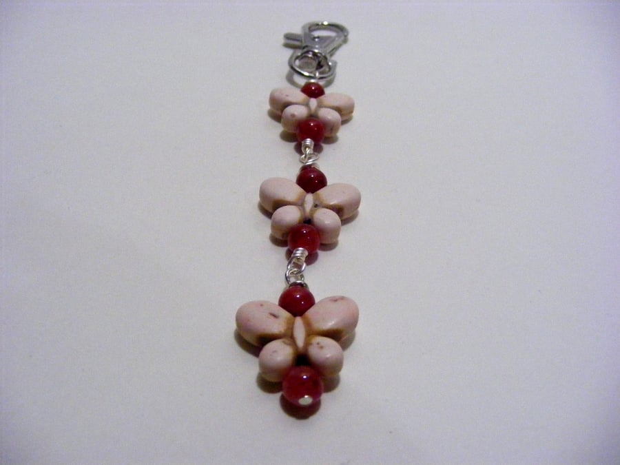 Magnesite Butterfly and Red Jade Bag charm